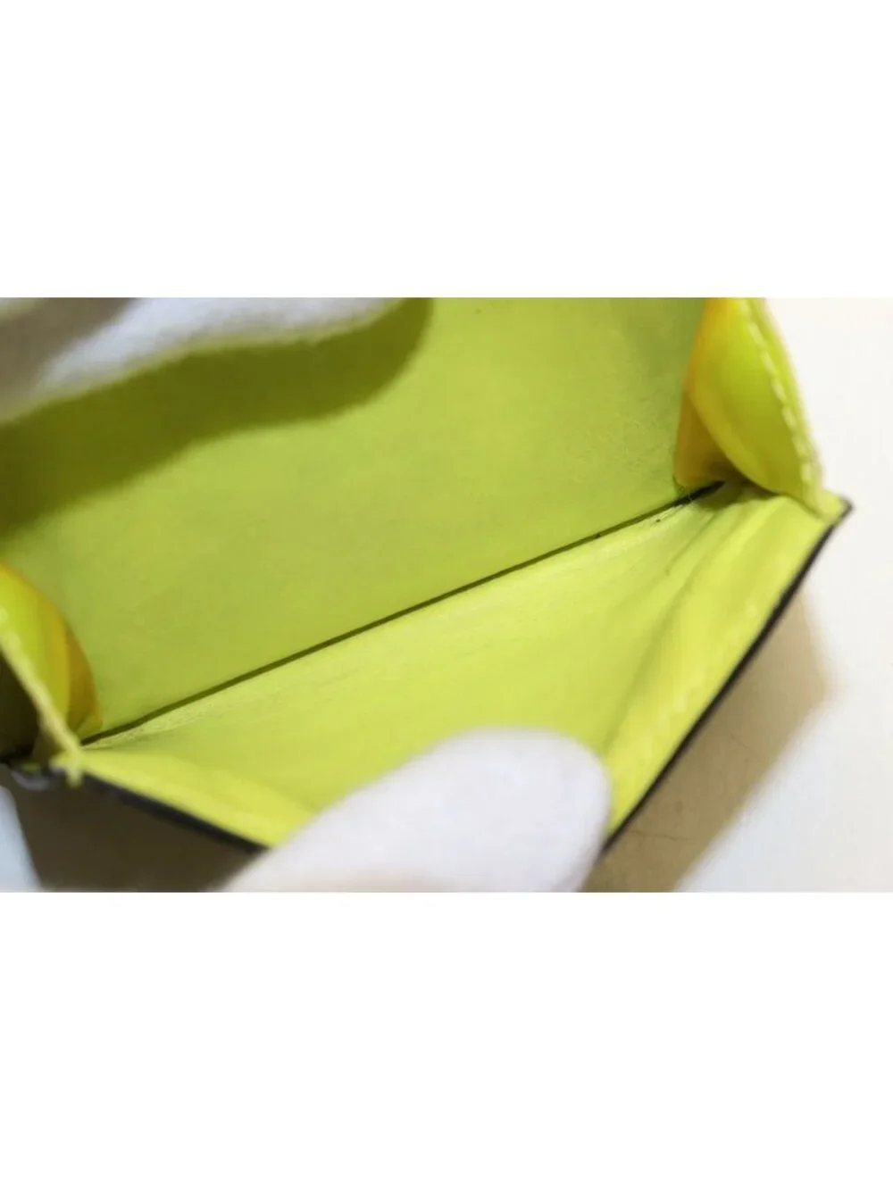 Louis Vuitton Taigarama Discovery Compact Leather Trifold Wallet